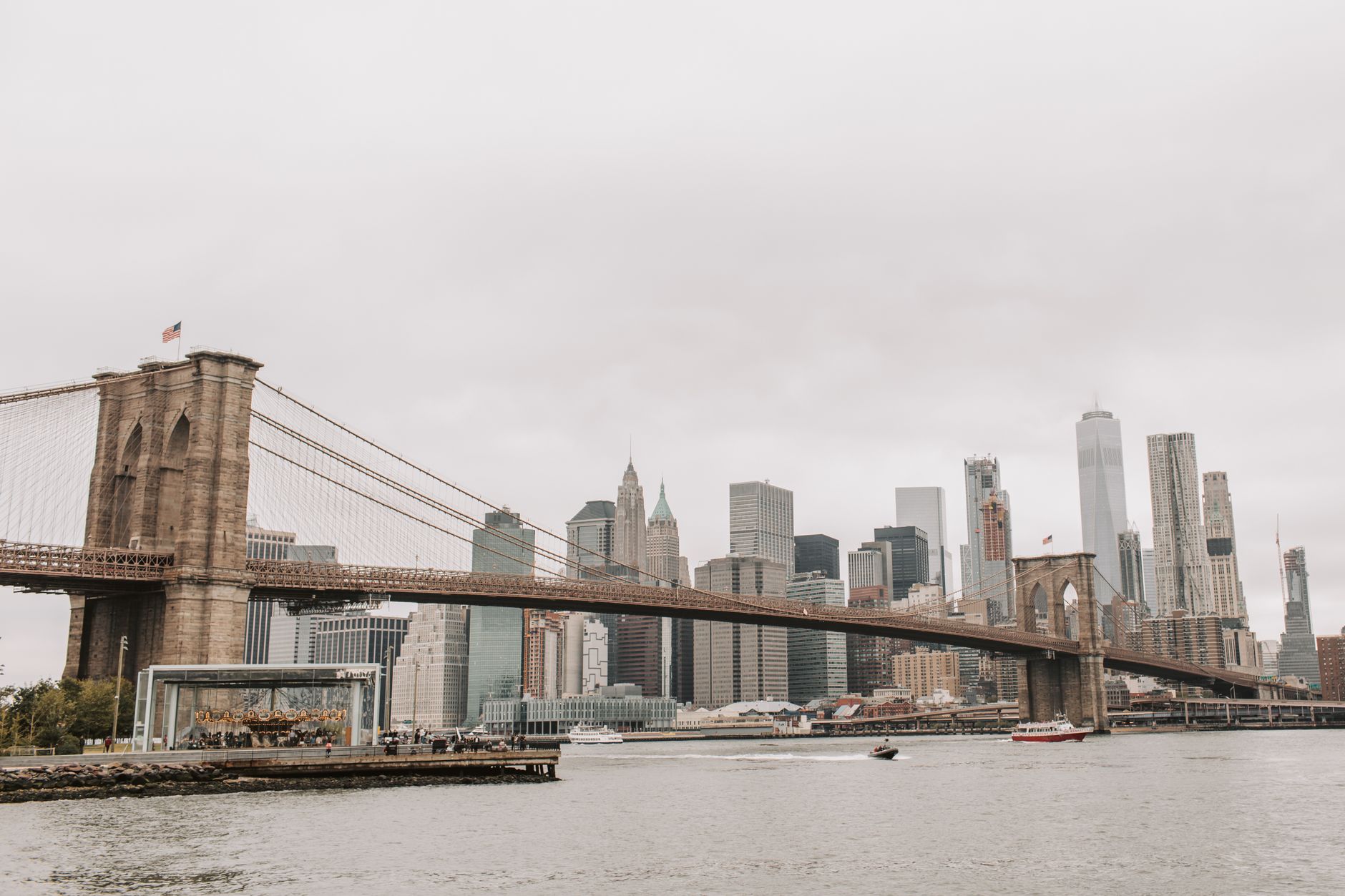 Stunning view of the Brooklyn Bridge with New York City skyline in the background.